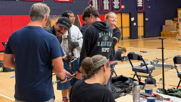 Coach Angus Babcock pictured laughing at something Chief Doug McIntyre from Reagan High School said in a brief aside while refilling air. A picture perfect example of this weeks comrardery and teamwork!