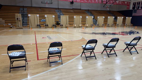 The main gymnasium was converted to 19 firing points for the camp, the firing point pictured on the left was used by Coach Sahi Weiser to practice on during the camp's early mornings while athletes arrived.